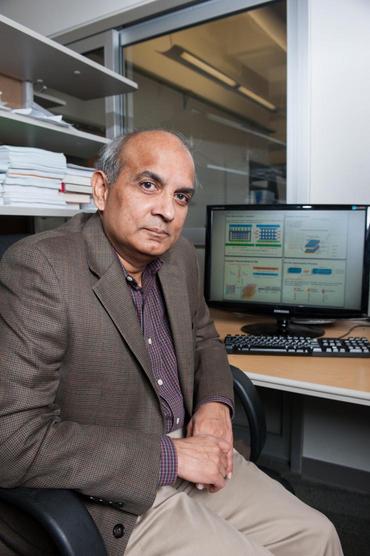 Sudha at his desk